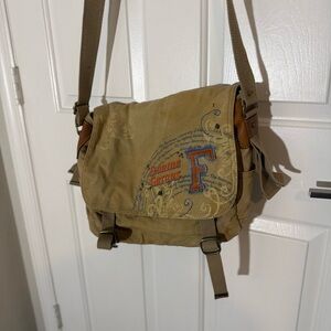 Tan Fossil Collegiate Messenger Bag with Embroidered Gators